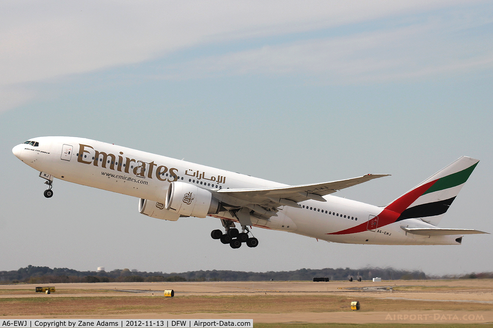 A6-EWJ, 2009 Boeing 777-21H/LR C/N 35590, Emirates Airlines departing DFW Airport