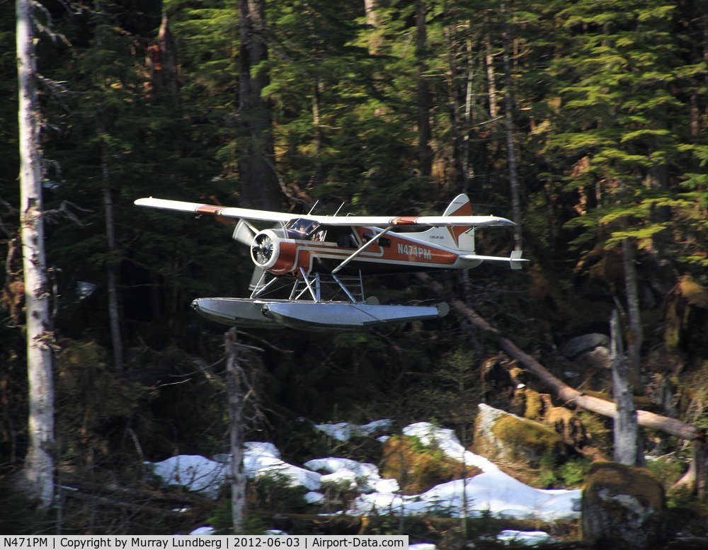 N471PM, De Havilland Canada U-6A Beaver C/N 1366/1914 (58-2034), Taking off from a wilderness lake in Misty Fjords National Monument, Alaska.