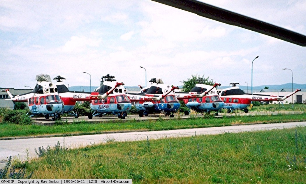 OM-EIP, 1975 Mil Mi-2 Hoplite C/N 513830114, Mil Mi-2 Hoplite [513830114] (Slov-Air) Bratislava-M R Stefanik~OM 21/06/1996. This the 2nd from the left along with 7 others shown stored here.