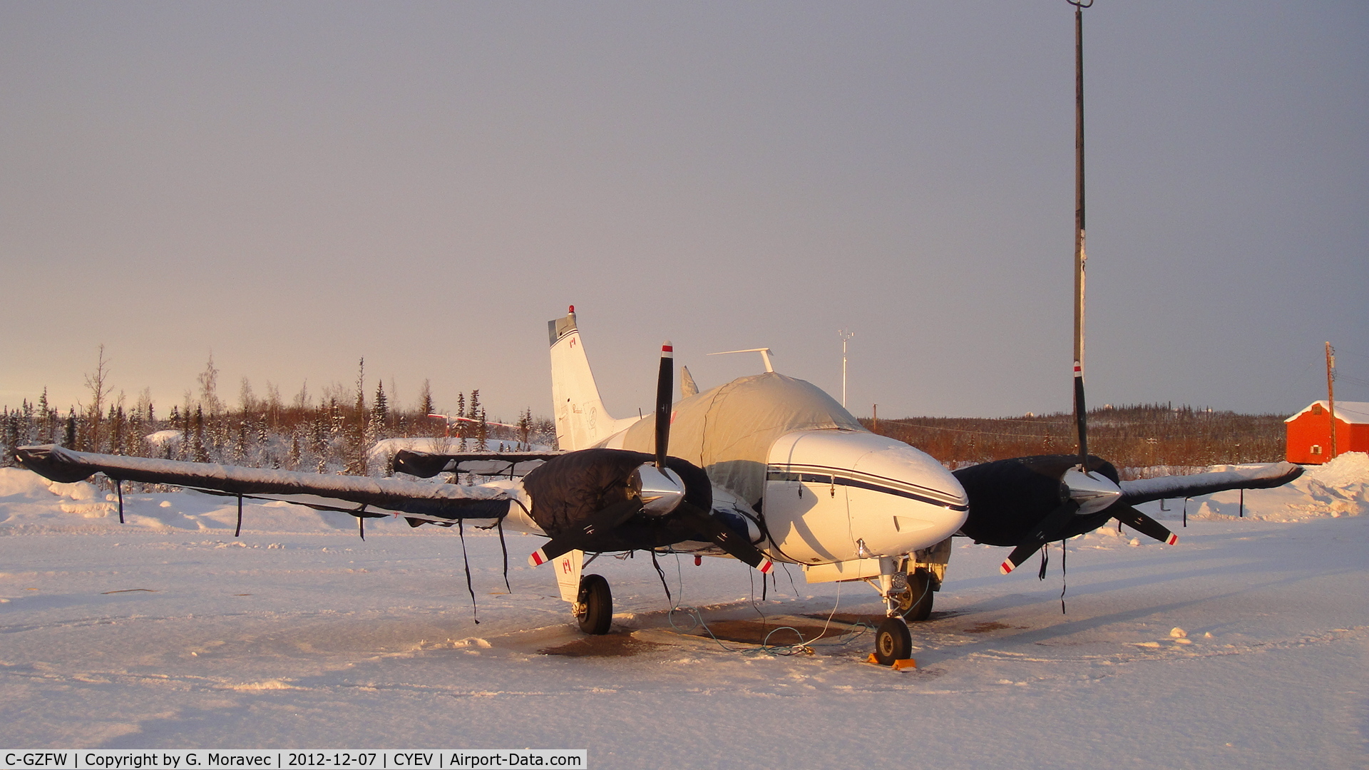 C-GZFW, 1962 Beech 95-A55 Baron C/N TC-300, December 2012 at Inuvik (CYEV), NWT, Canada