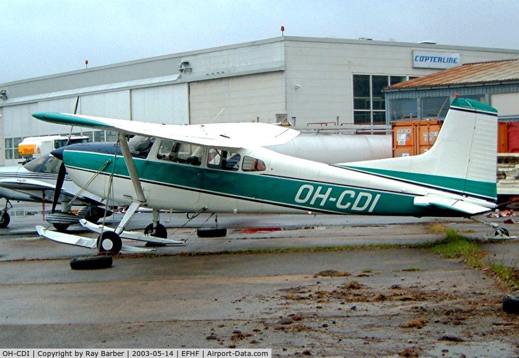 OH-CDI, Cessna A185E Skywagon 185 C/N 185-1529, Cessna A.185E Skywagon 185 [185-1529] Helsinki-Malmi~OH 14/05/2003. Seen here with snow ski's.