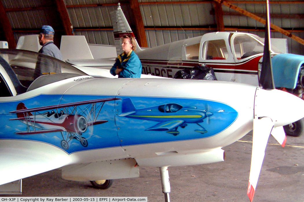 OH-XJP, Lancair 320 C/N 169, Lancair 320 [169] Piikajarvi~OH 15/05/2003. Showing the art work on this side of the aircraft.