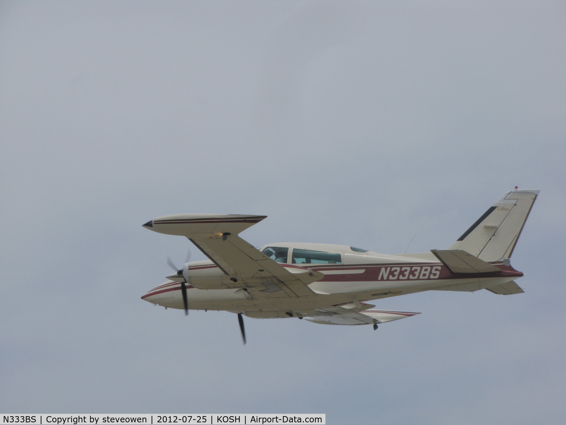 N333BS, Cessna 310R C/N 310R0865, leaving Oshkosh