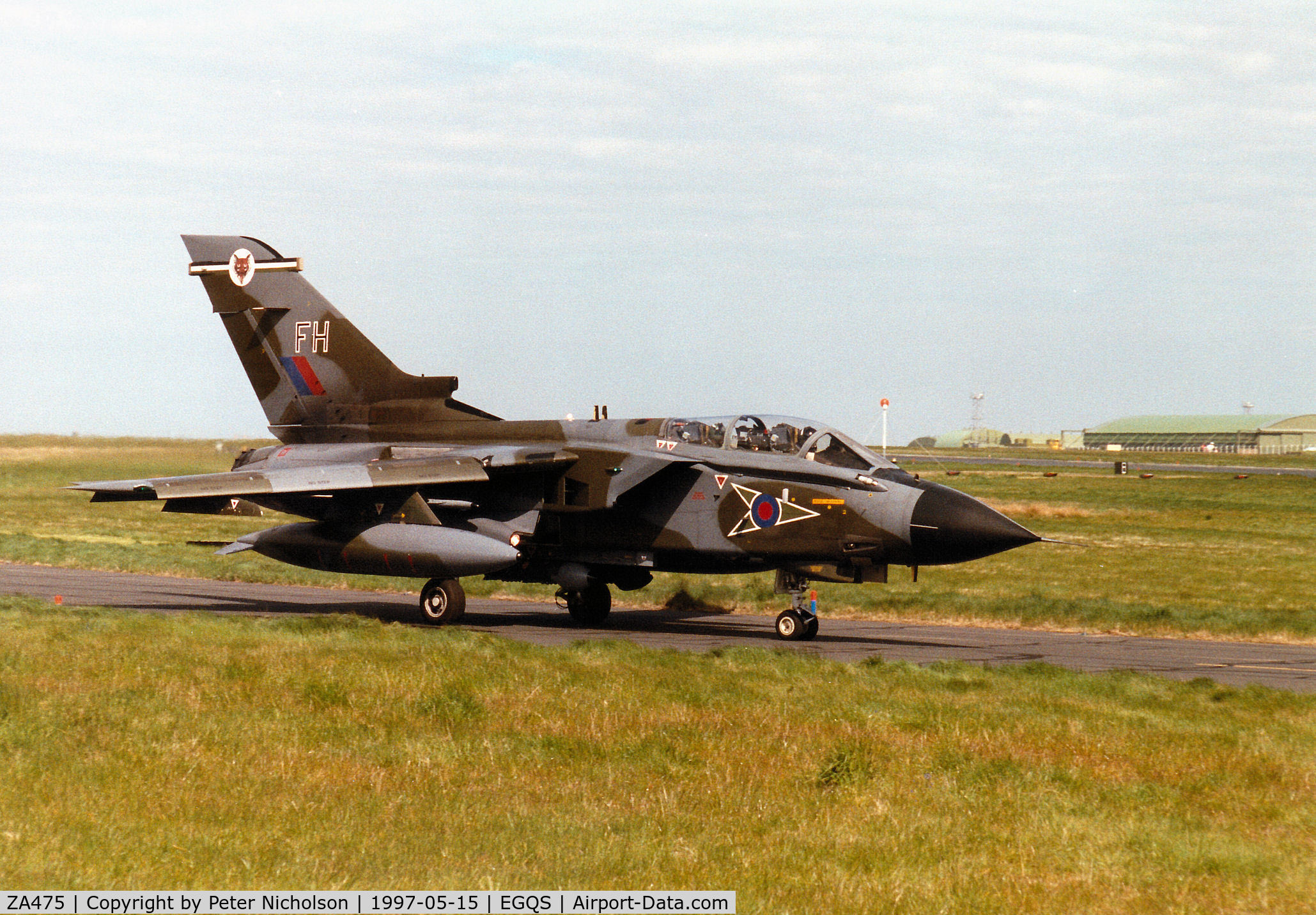ZA475, 1983 Panavia Tornado GR.1 C/N 302/BS105/3141, Tornado GR.1, callsign Jackal 3, of 12 Squadron taxying to Runway 05 at RAF Lossiemouth in the Summer of 1997.
