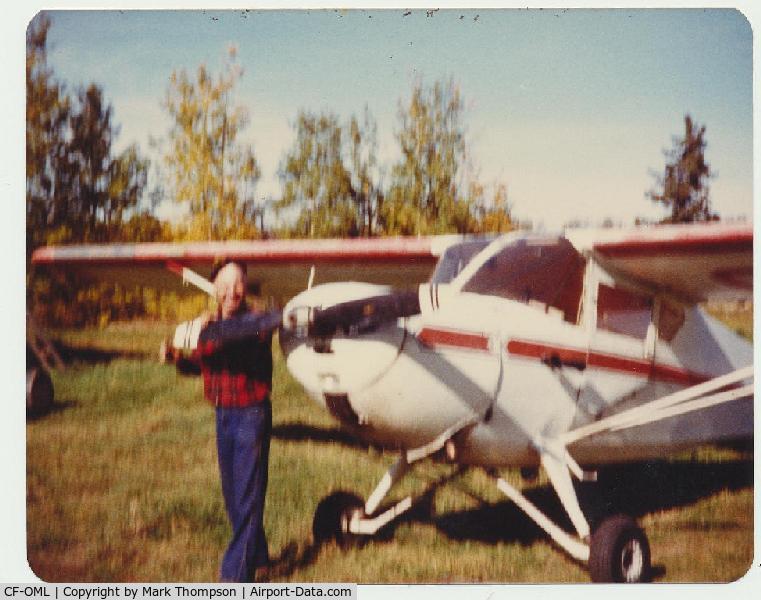 CF-OML, 1946 Commonwealth 185 Skyranger C/N 1869, A fuzzy pic of Walt Pudar with his plane on his own farm airstrip in Sangudo Alberta. I took this picture in 1983.
