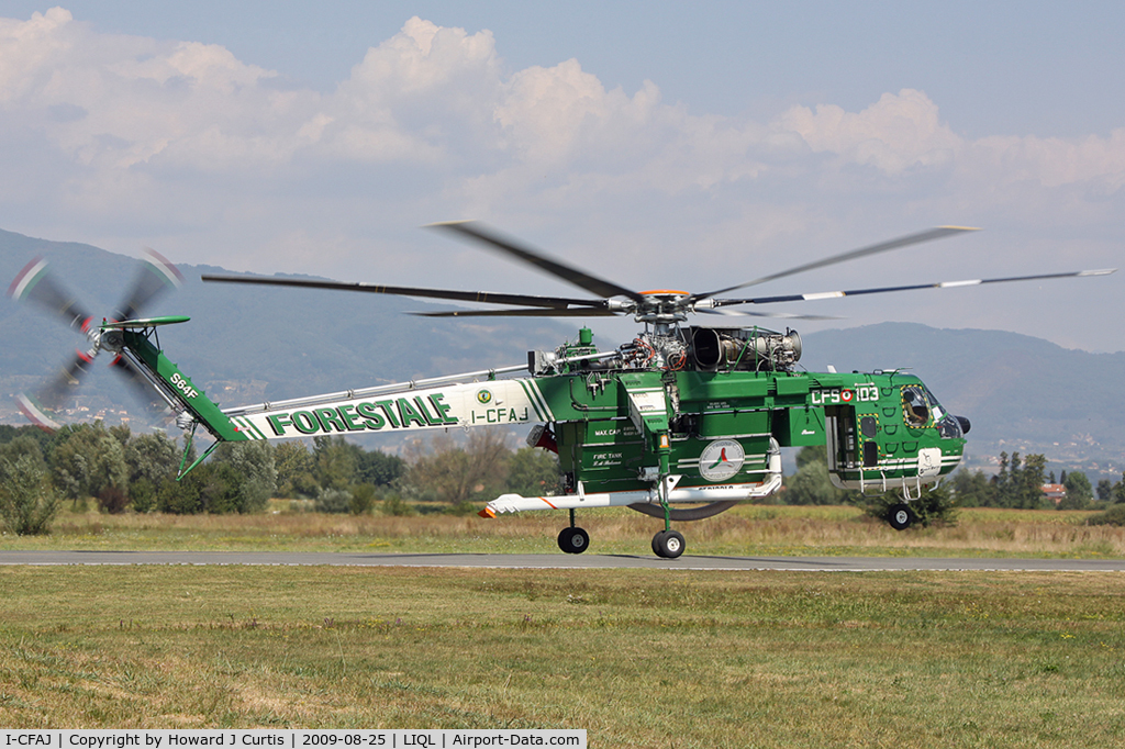 I-CFAJ, 1969 Sikorsky S-64F Skycrane C/N 64-078, Heading off to fight another fire.