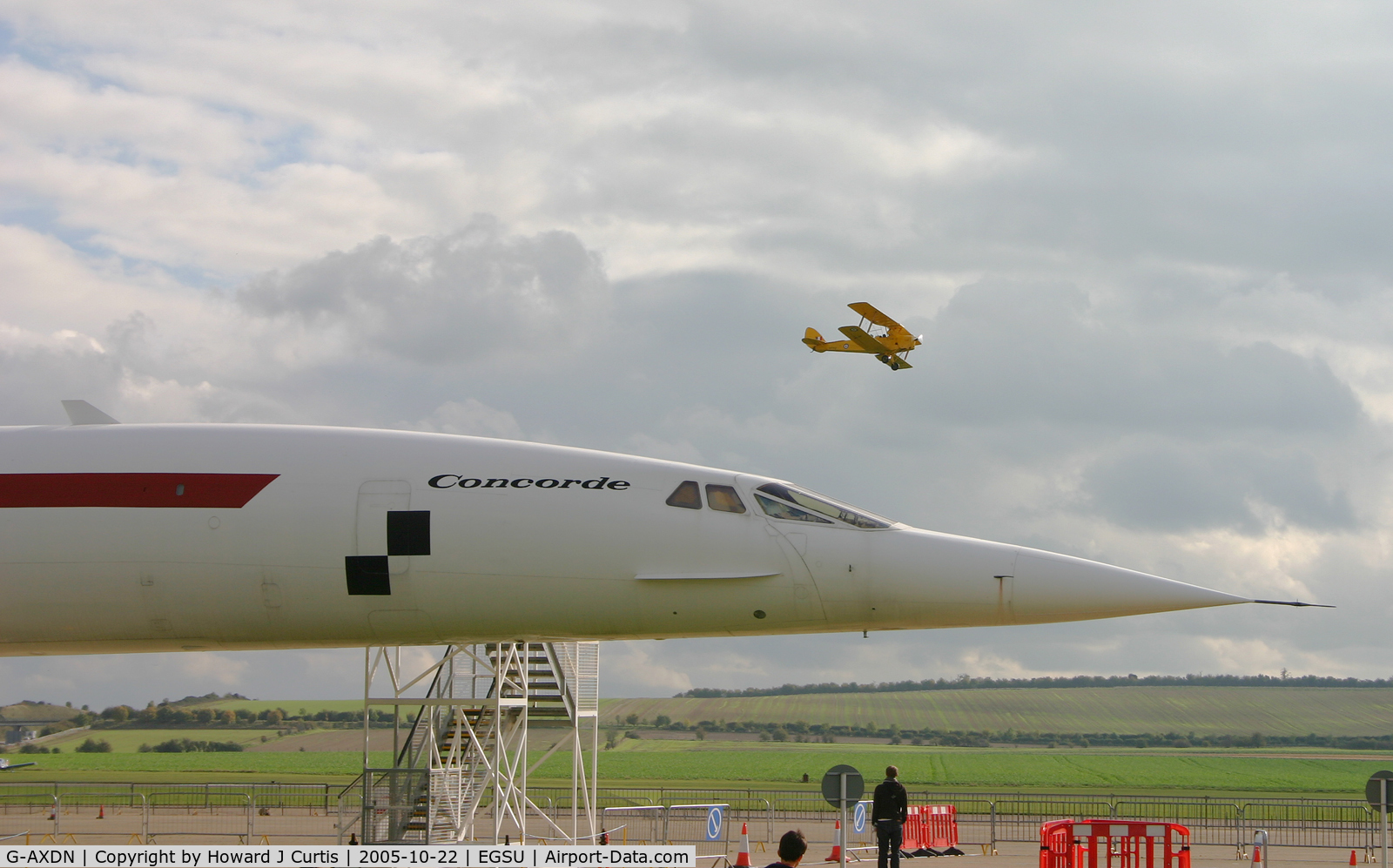 G-AXDN, 1968 Aerospatiale-BAC Concorde Prototype C/N 01/13522, Contrasting the new (sadly grounded) Concorde with the old (still flying) Tiger Moth behind.