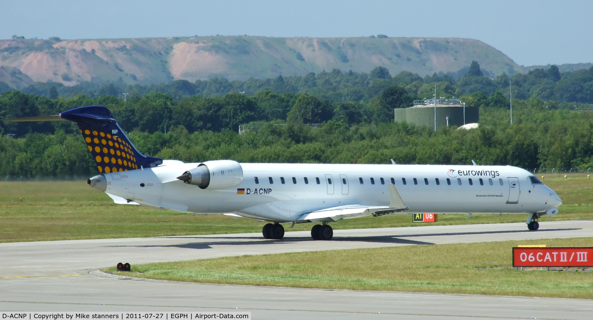 D-ACNP, 2010 Bombardier CRJ-900LR (CL-600-2D24) C/N 15259, “Lufthansa 5MK” waiting to enter runway 06 For departure back to DUS