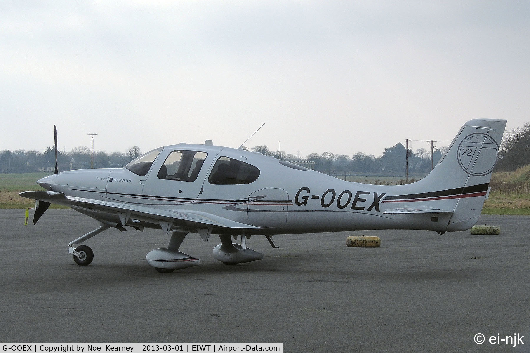 G-OOEX, 2010 Cirrus SR22T C/N 0010, Parked on the apron at Weston.