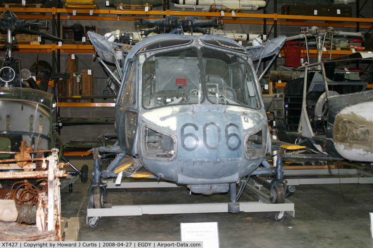 XT427, 1965 Westland Wasp HAS.1 C/N F9597, Royal Navy, coded 606. In the FAA Museum's Cobham Hall storage and restoration facility.