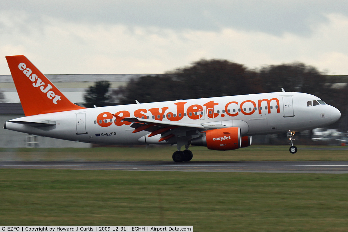 G-EZFO, 2009 Airbus A319-111 C/N 4080, easyJet. Taken from the Bournemouth Aviation Museum's viewing bus. On departure from runway 08.