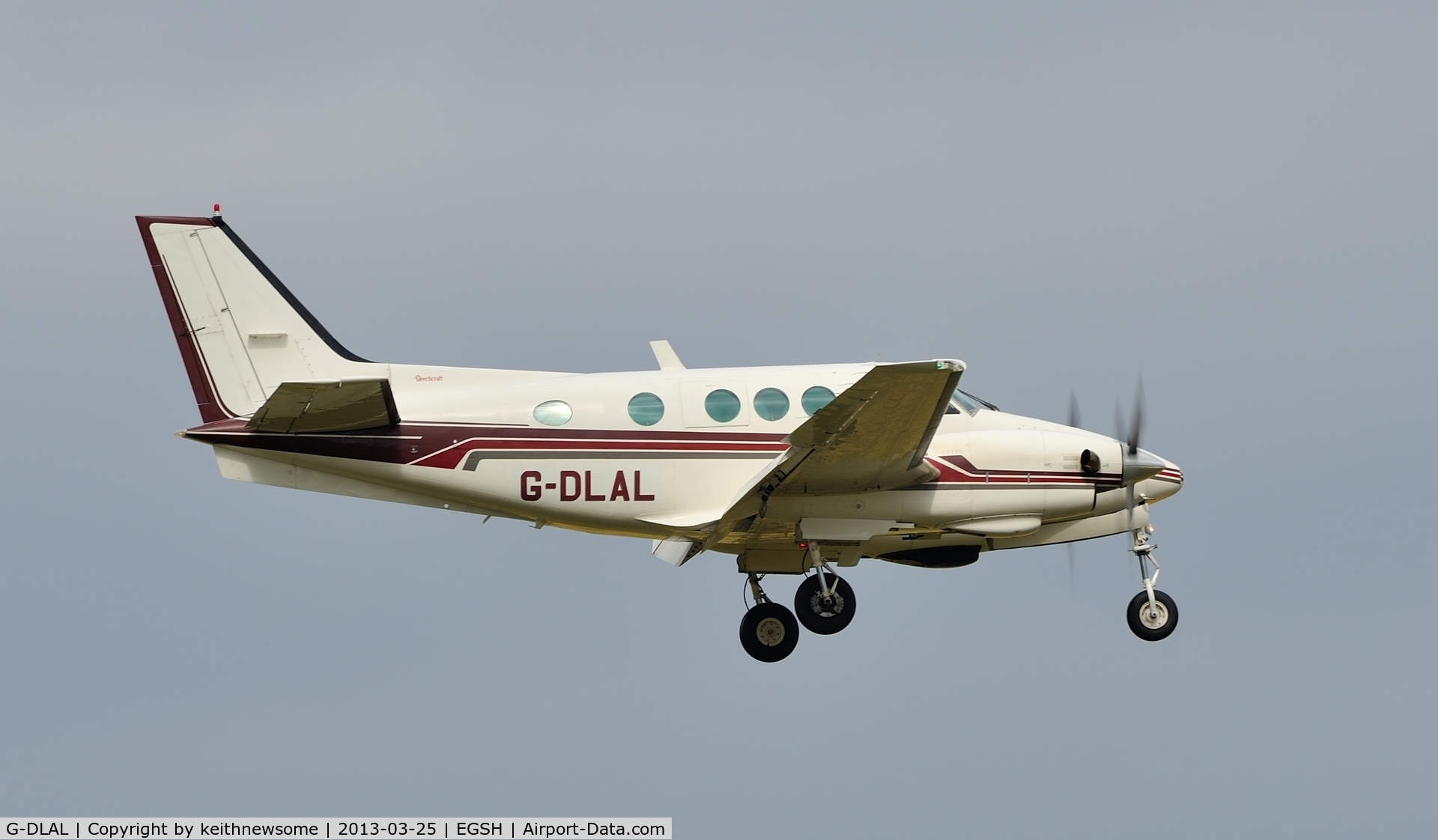 G-DLAL, 1976 Beech E90 King Air C/N LW-187, Landing onto 09 in strong wind.