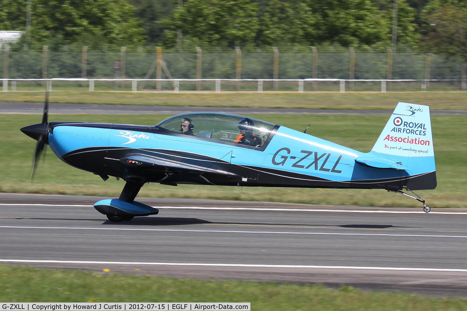 G-ZXLL, 2011 Extra EA-300L C/N 1319, At the Farnborough Air Show.