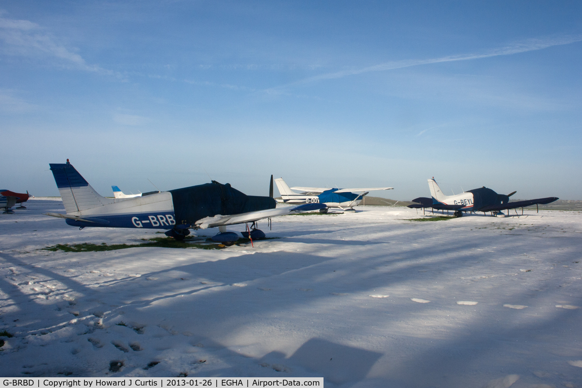 G-BRBD, 1974 Piper PA-28-151 Cherokee Warrior C/N 28-7415315, PA.28 G-BRBD, Cessna 182 G-DOVE and PA.28 G-BEYL in the snow. My 5000th aircraft photo on Airport-Data.com.