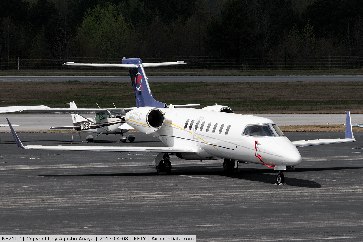 N821LC, 2010 Learjet 45 C/N 406, Parked at the Signature ramp.