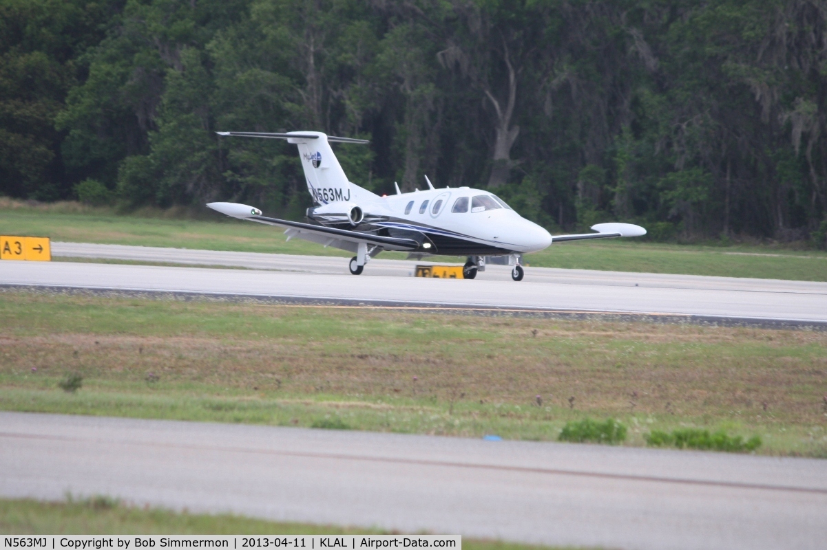 N563MJ, 2007 Eclipse Aviation Corp EA500 C/N 000027, Arriving at Lakeland, FL during Sun N Fun 2013