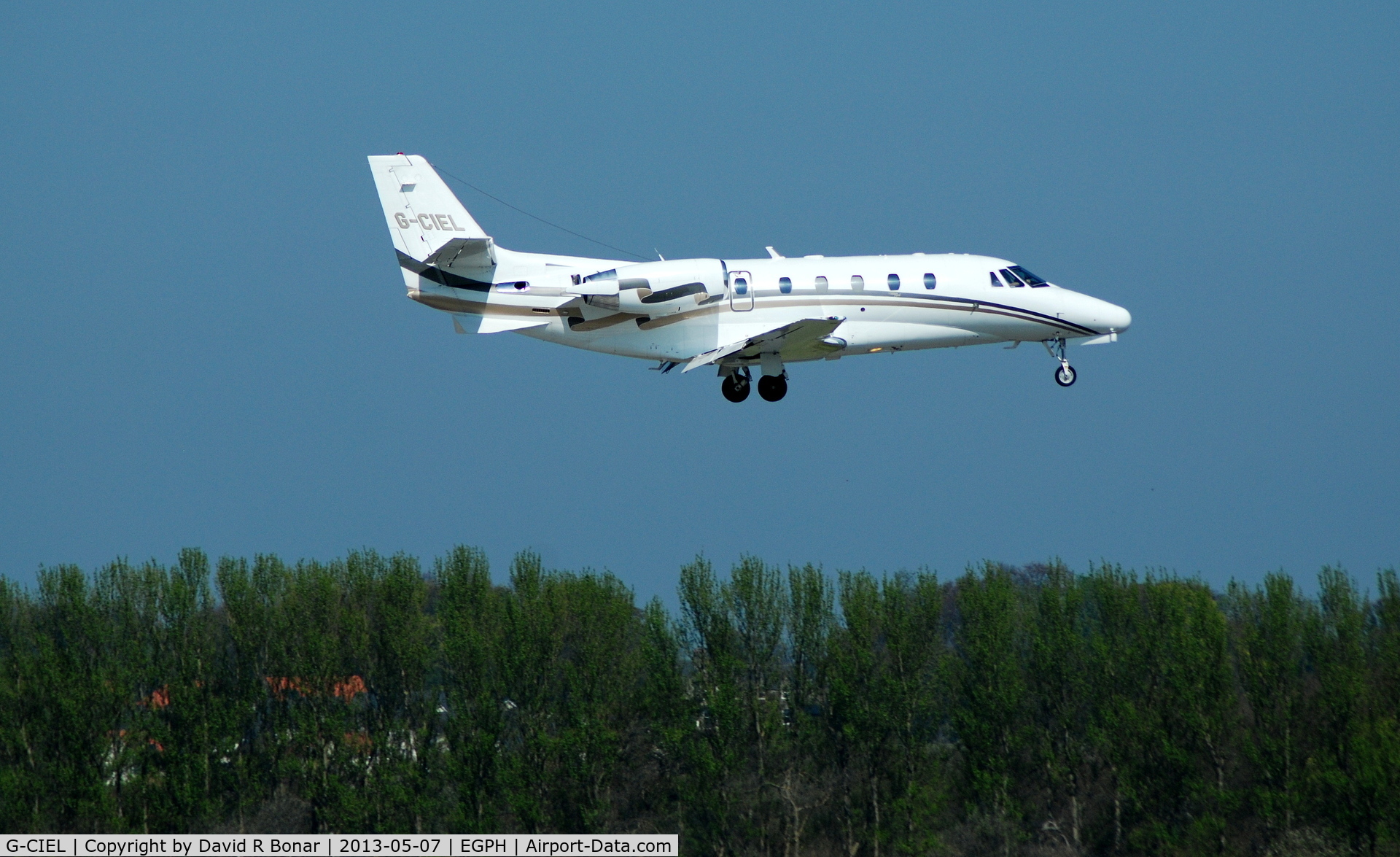 G-CIEL, 2002 Cessna 560XL Citation Excel C/N 560-5247, Short finals for a 06 arrival. Inbound from london