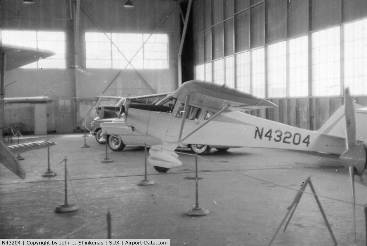 N43204, 1946 Taylorcraft BC12-D C/N 6863, Photographed around 1964, in a hangar located at the Sioux City Municipal Airport (now Sioux Gateway Airport, Sioux City, Ia.).  Believed owned at the time by Vince Burke.