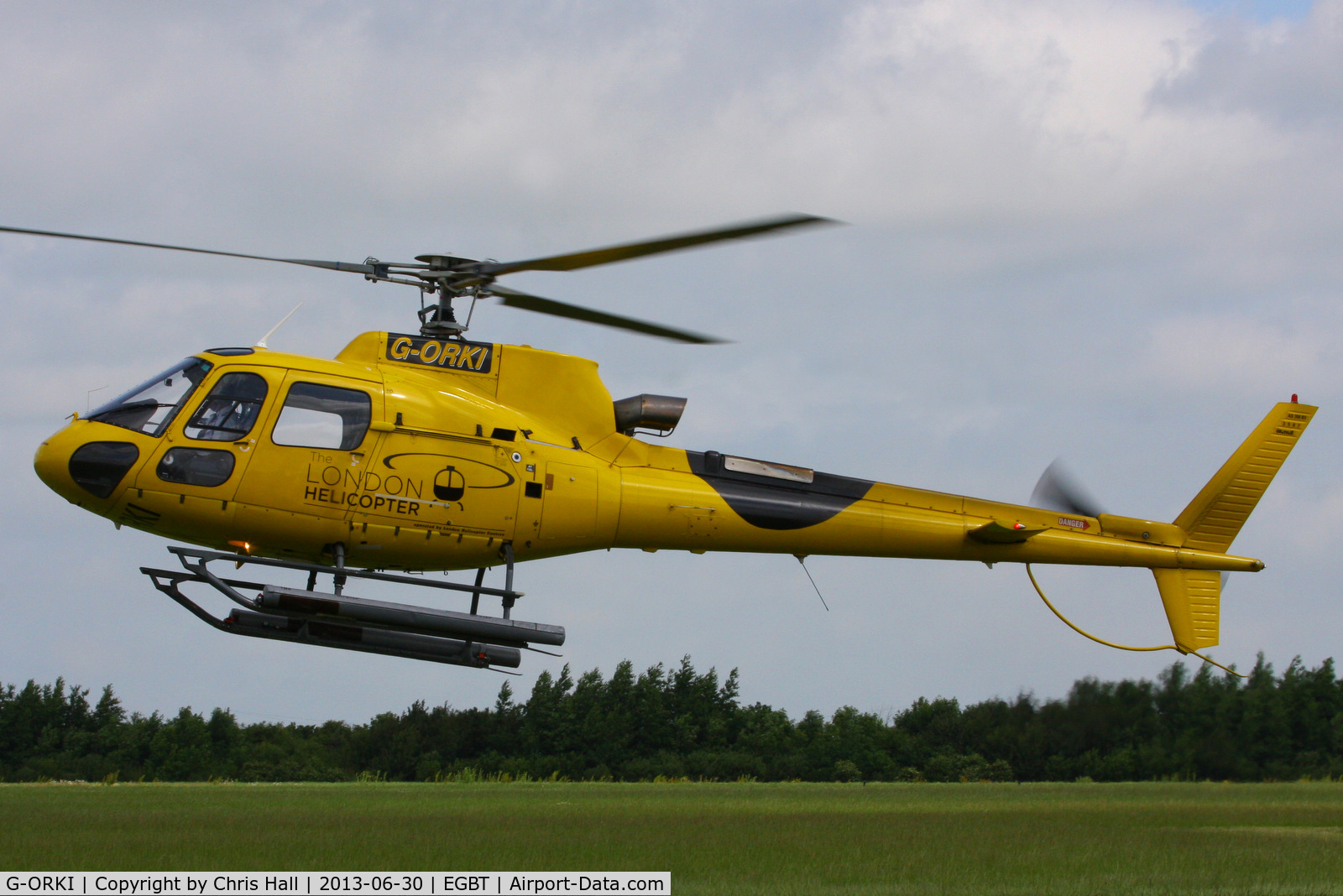 G-ORKI, 2002 Eurocopter AS-350B-3 Ecureuil Ecureuil C/N 3587, being used for ferrying race fans to the British F1 Grand Prix at Silverstone