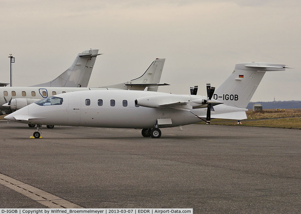 D-IGOB, 1992 Piaggio P-180 Avanti C/N 1016, Based at EDDR, waiting to be towed into the hangar.