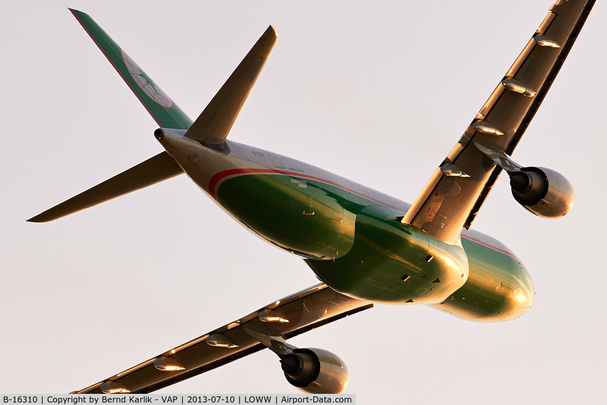 B-16310, 2005 Airbus A330-203 C/N 678, Climbing out into the setting sun...