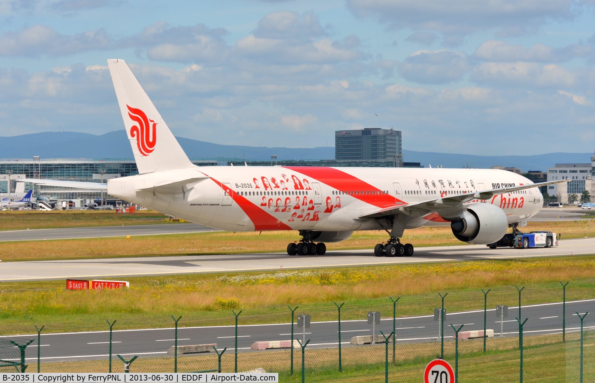 B-2035, 2012 Boeing 777-39L/ER C/N 38674, Smiling faces on this B773 of Air China.