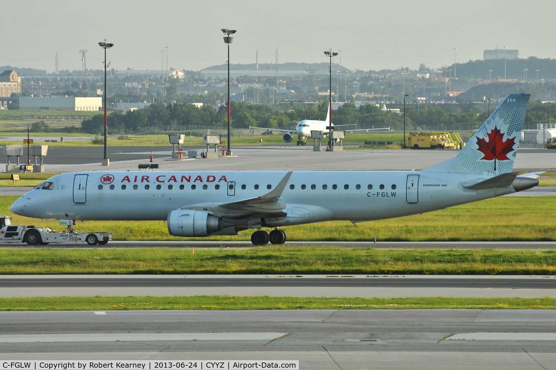 C-FGLW, 2006 Embraer 190AR (ERJ-190-100IGW) C/N 19000022, On tow around to parking