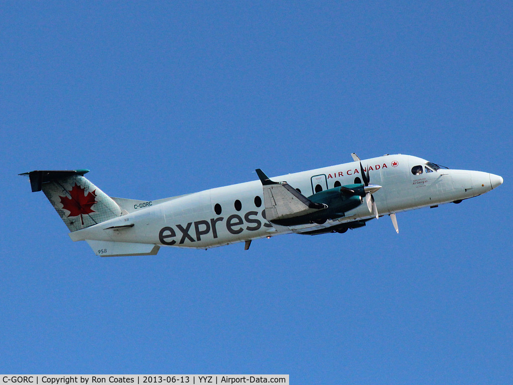 C-GORC, 1998 Beech 1900D C/N UE-320, 1998 Beech 1900D lifts off runway 23 into a cloudless sky at Toronto Int'l Airport (YYZ)