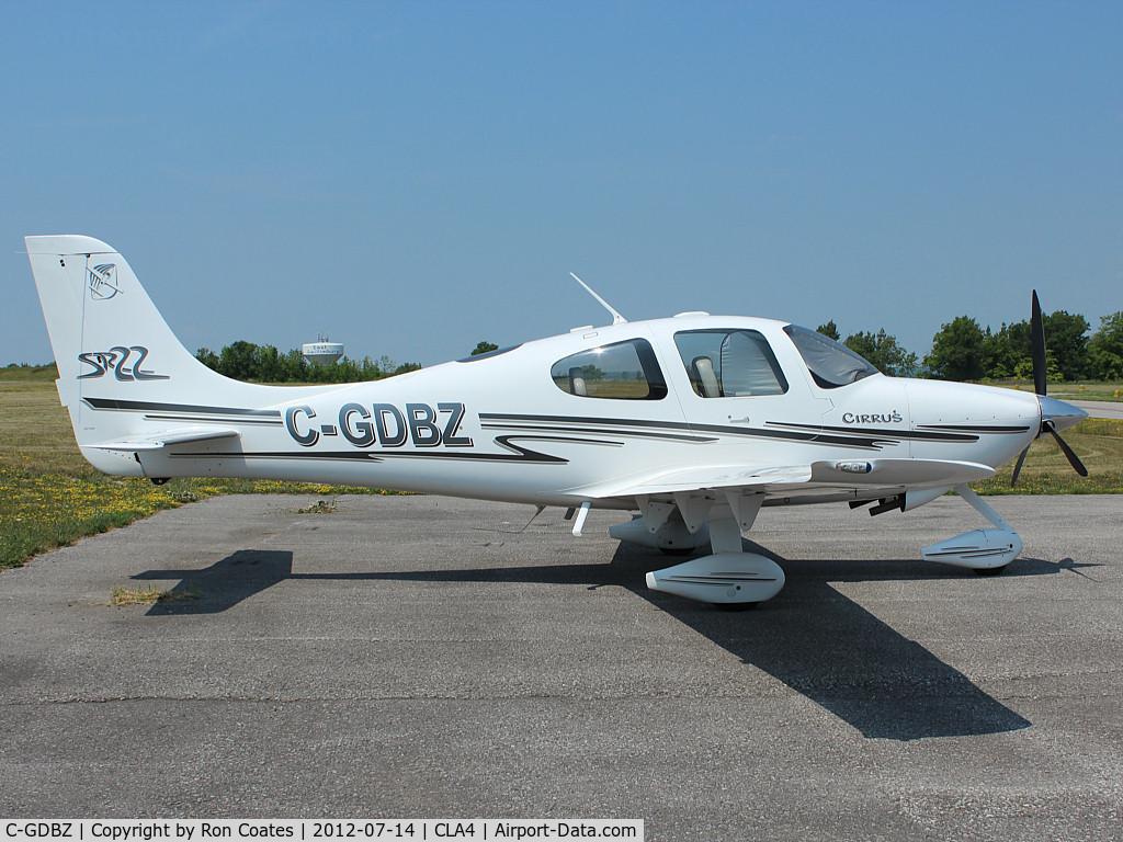 C-GDBZ, 2003 Cirrus SR22 C/N 0499, This 2003 Cirrus SR22 sits quietly in the noon day sun at Holland Landing Airport (CLA4) north of Toronto
