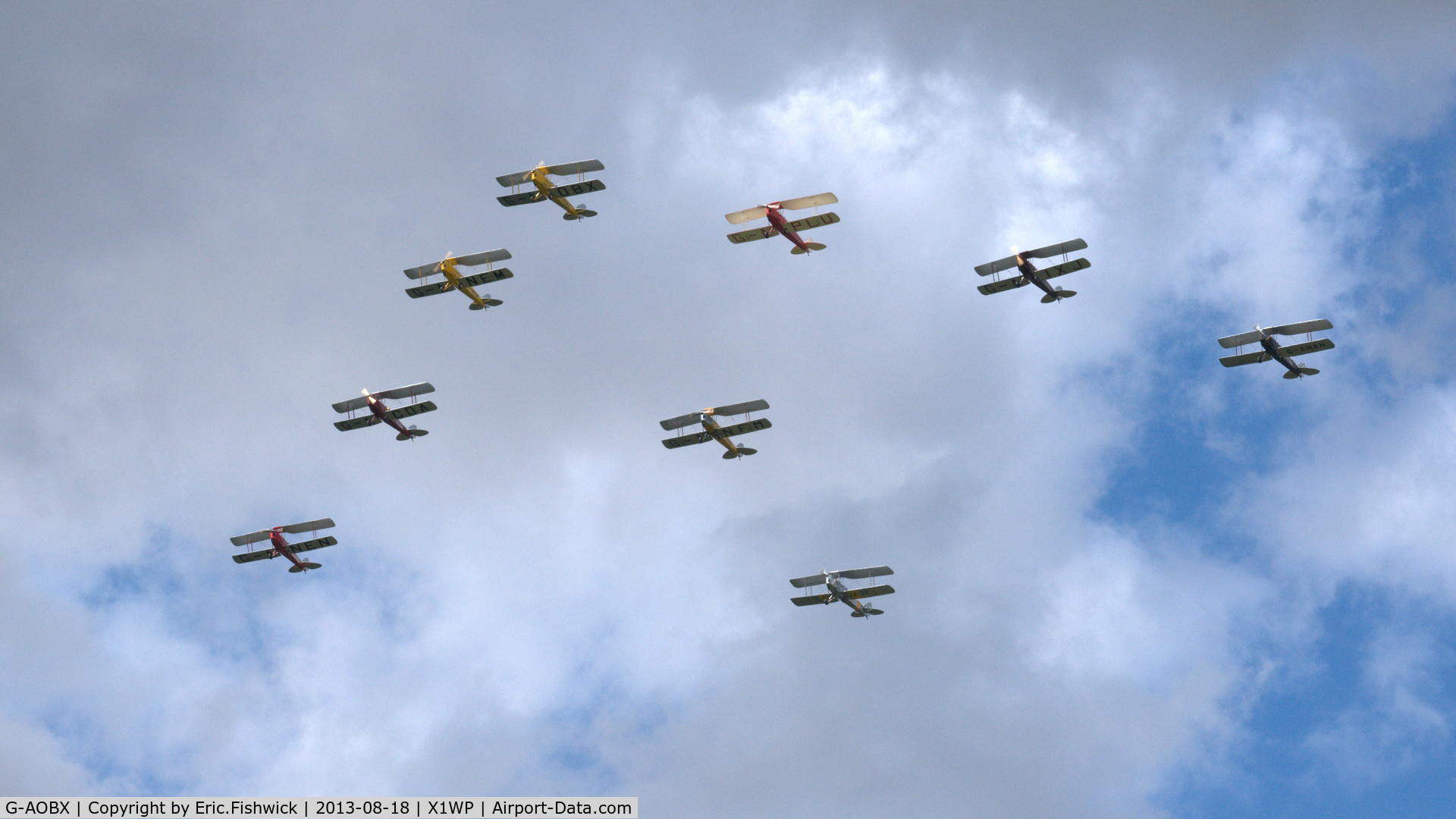 G-AOBX, 1940 De Havilland DH-82A Tiger Moth II C/N 83653, 45. G-AOBX leading the Tiger 9 Formation Display Team at The 28th. International Moth Rally at Woburn Abbey, Aug. 2013.
