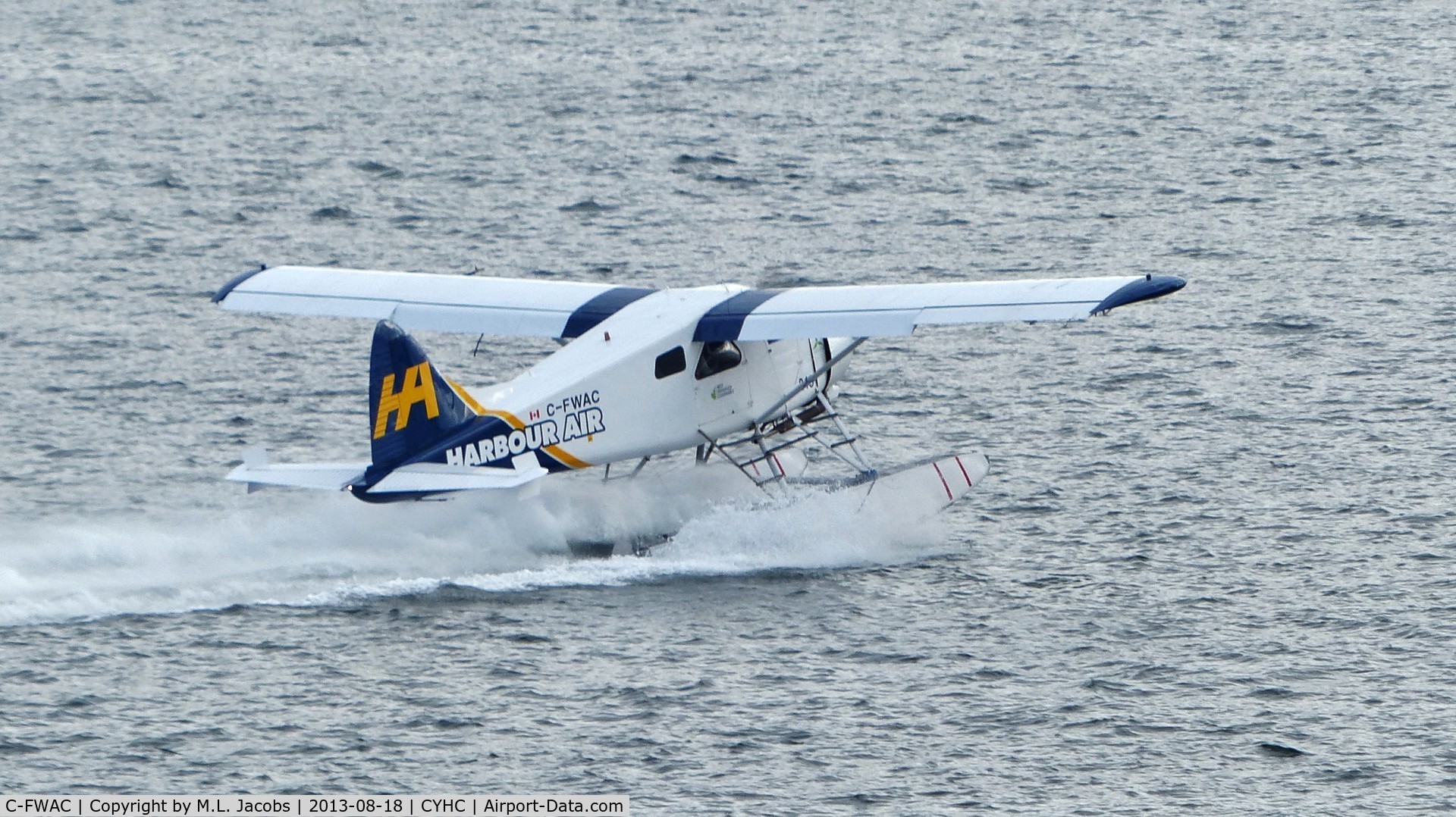 C-FWAC, 1959 De Havilland Canada DHC-2 Beaver Mk. I C/N 1356, Harbour Air #219 taking off from Coal Harbour on an overcast morning.