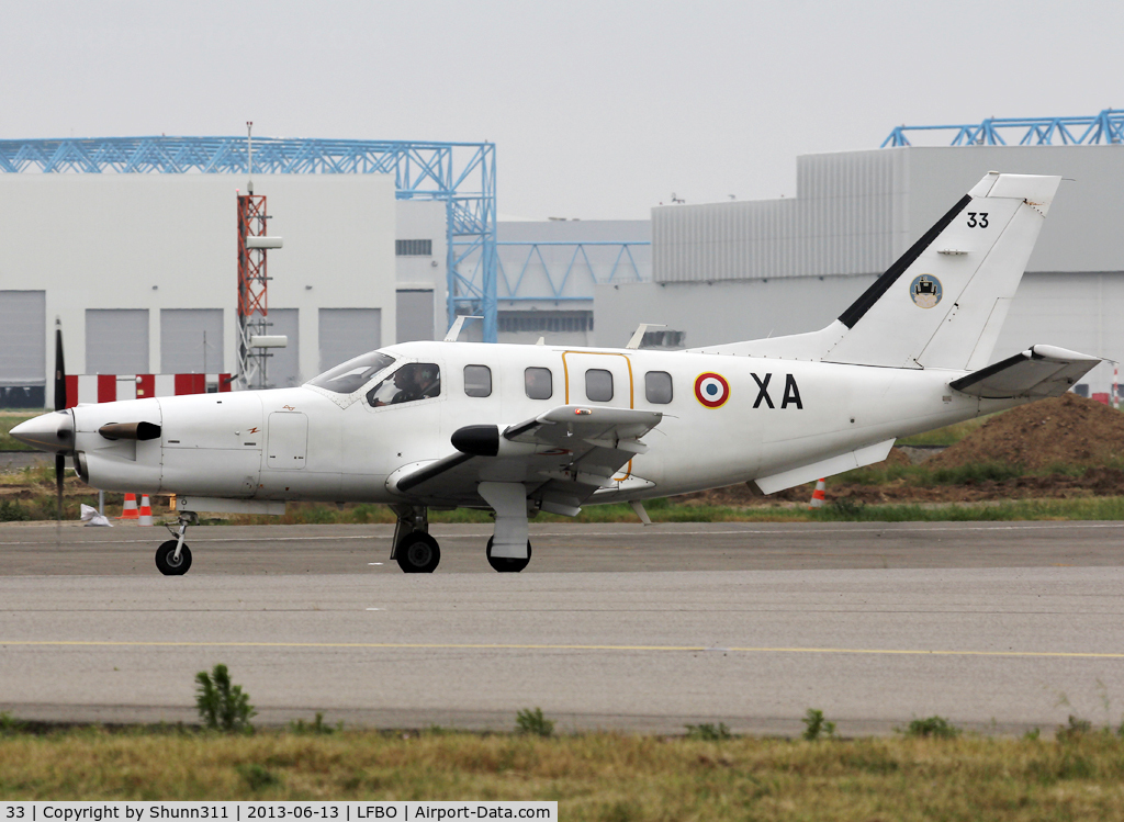 33, Socata TBM-700A C/N 33, Taxiing to the Military area...