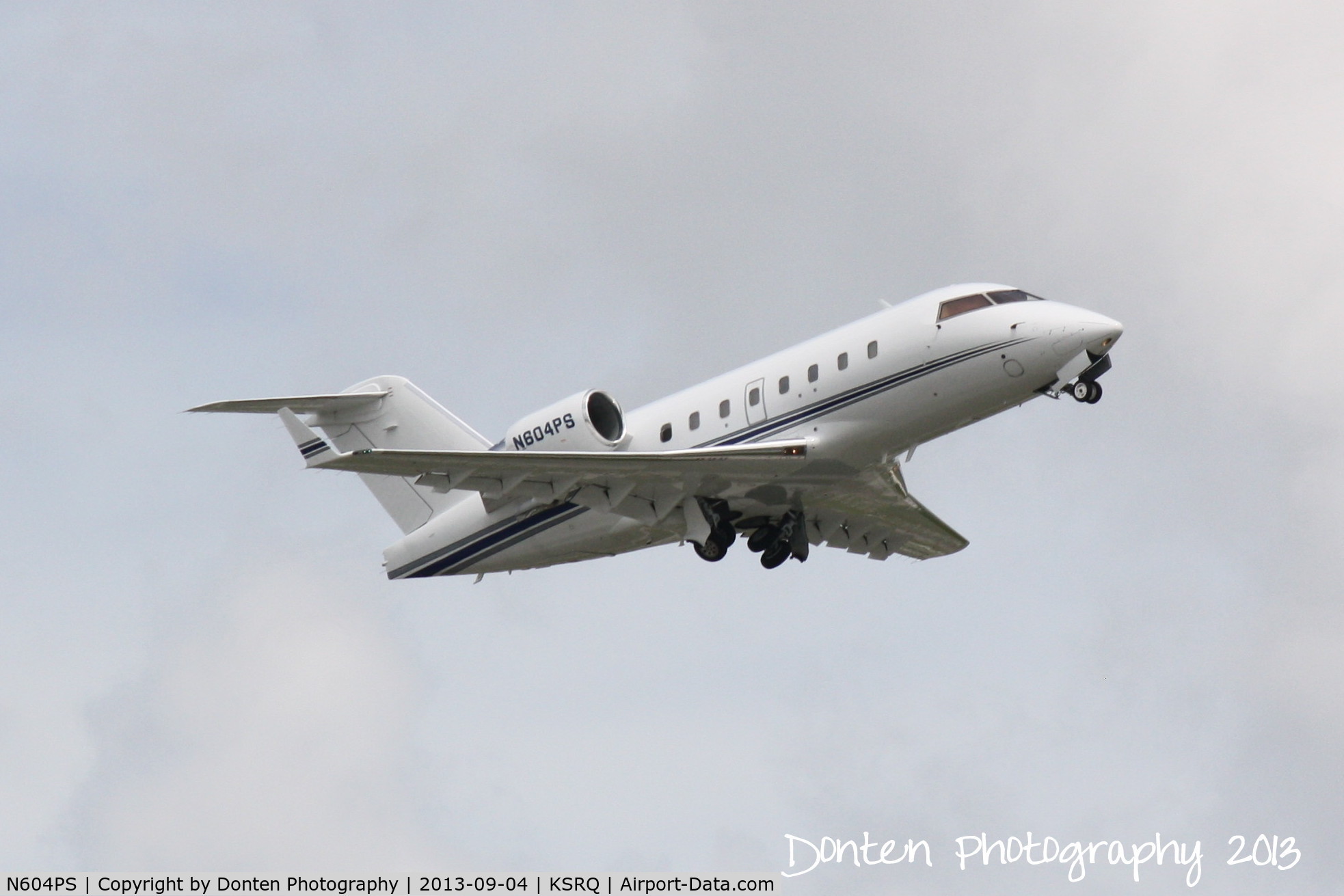 N604PS, 2000 Bombardier Challenger 604 (CL-600-2B16) C/N 5447, Elite Jet 604 (N604PS) departs Sarasota-Bradenton International Airport enroute to Palm Beach International Airport