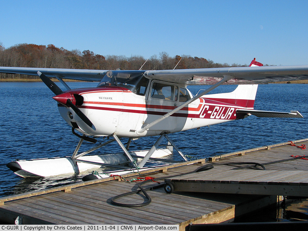 C-GUJR, 1976 Cessna 172M C/N 17267157, After a fun day of flying around over cottage country the two pilots in this Skyhawk stopped here for fuel. This is at Lake St. John Seaplane base that's just north of Orillia, Ontario.