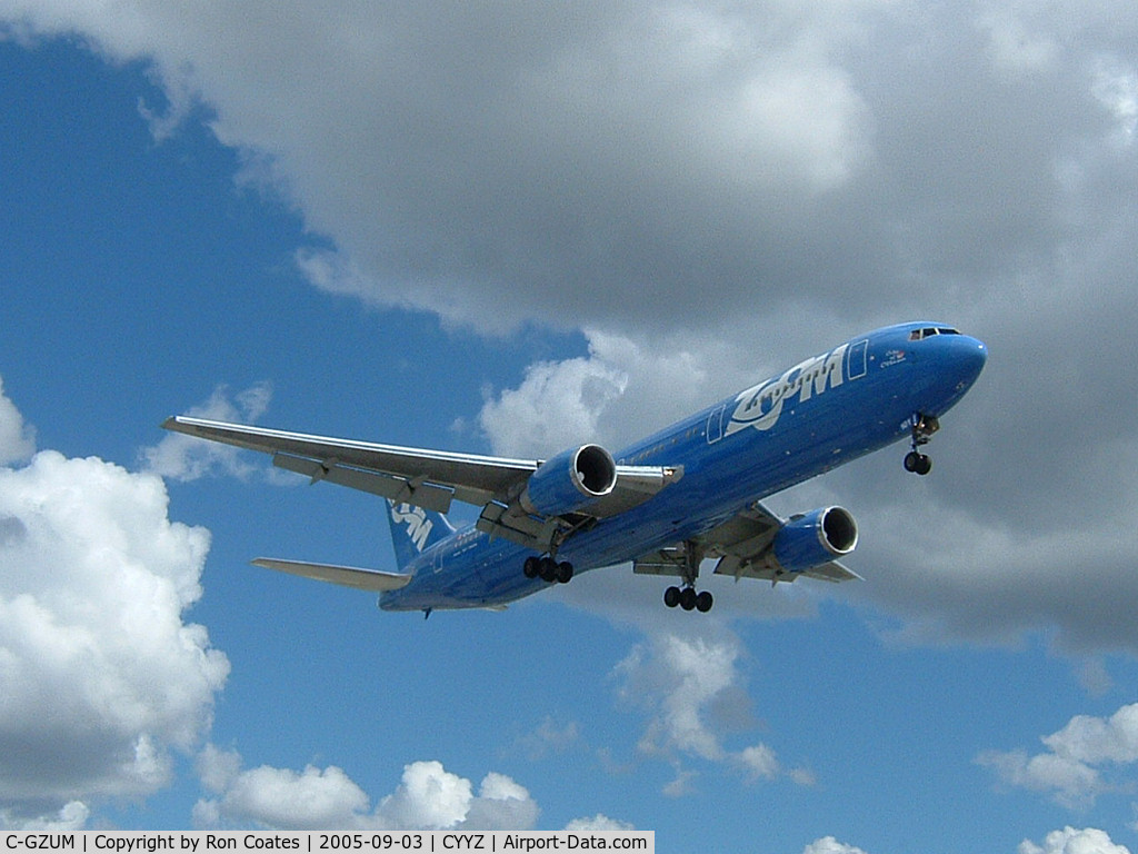 C-GZUM, 1993 Boeing 767-328 C/N 27135, Boeing 767 of the now out of Business ZOOM Airlines landing on rwy 23 at Toronto Int'l Airport. Zoom went out of business August 28, 2008.