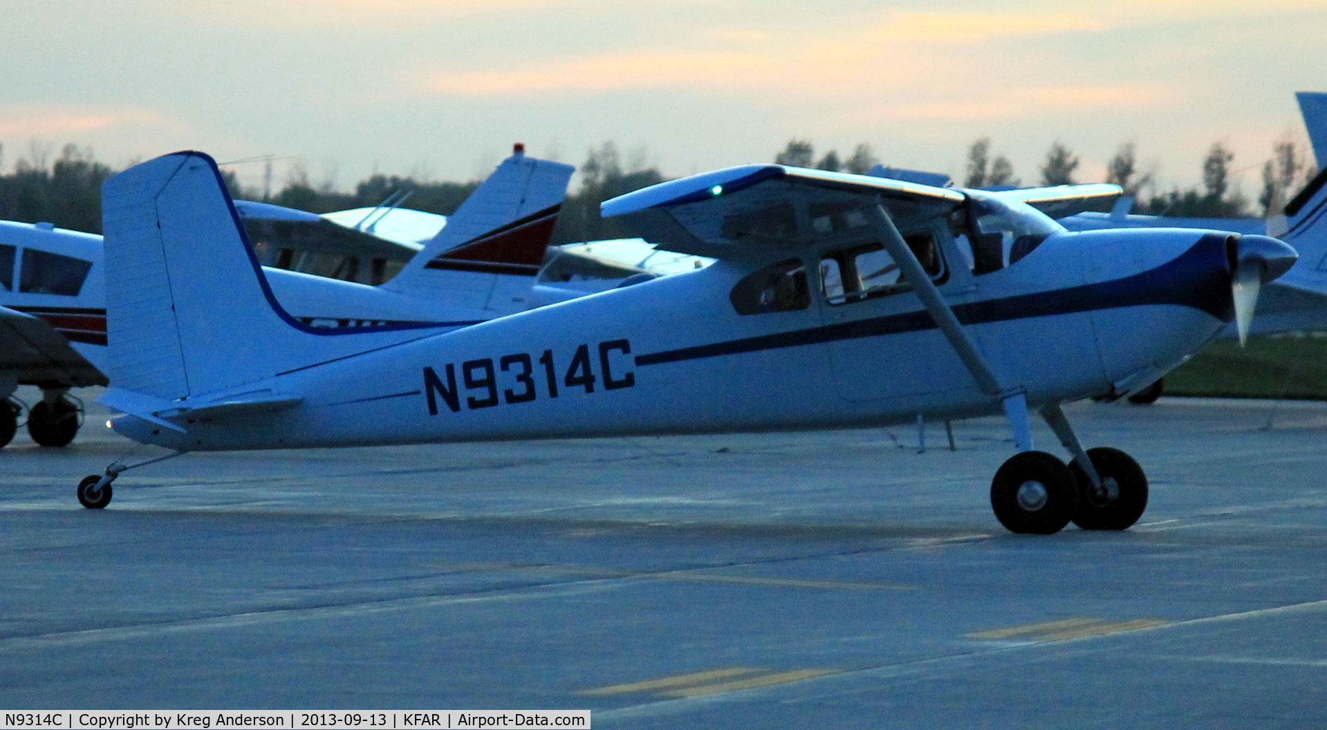 N9314C, 1955 Cessna 180 C/N 31712, Cessna 180 Skywagon taxiing to the ramp at Fargo Jet Center.
