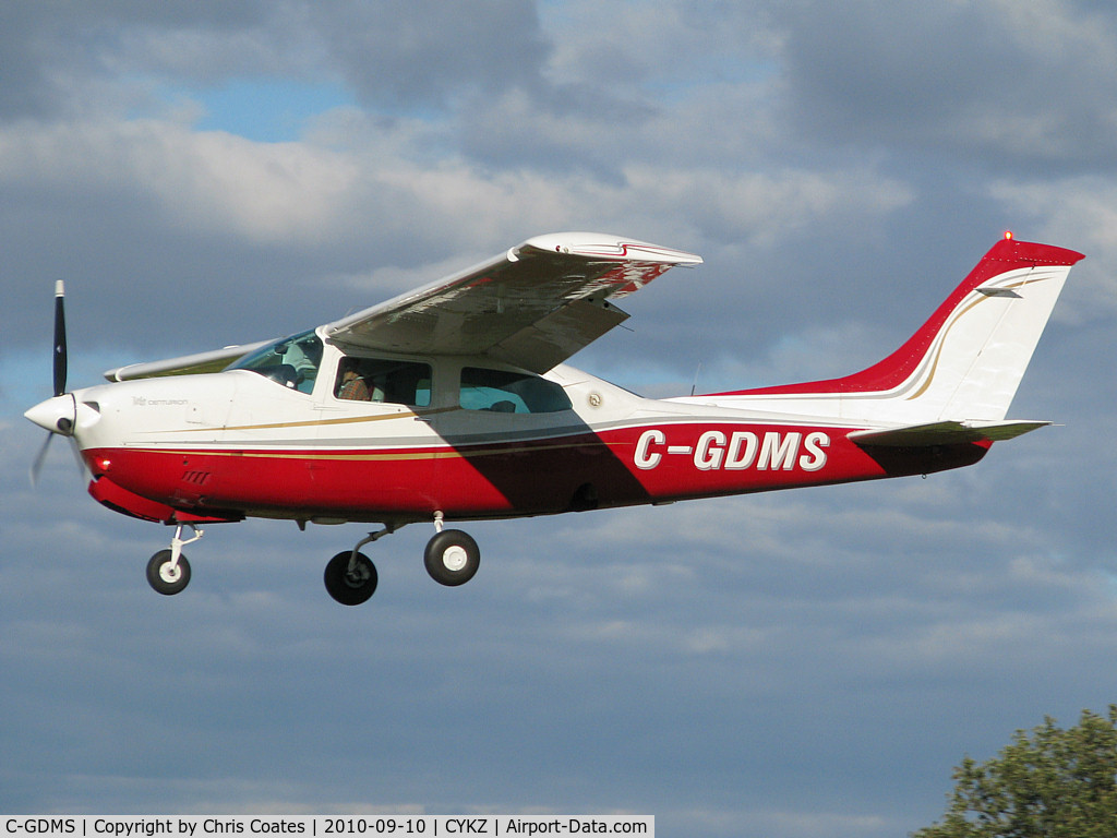 C-GDMS, 1977 Cessna T210M Turbo Centurion C/N 21062013, This gorgeous Centurion was on short final for rwy 33 on this Fall day. I like its new paint with the solid red belly.