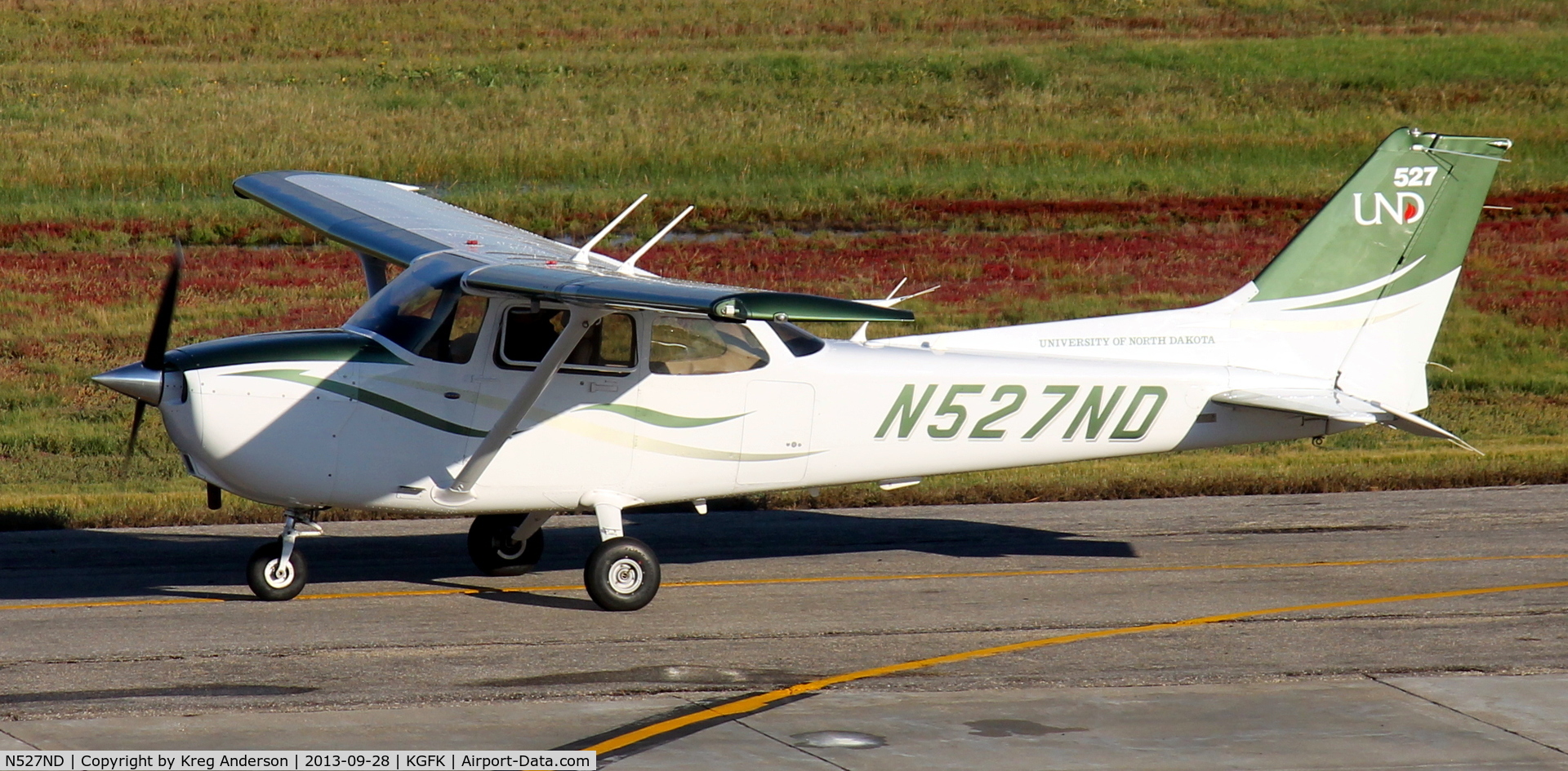 N527ND, 2008 Cessna 172S C/N 172S10818, University of North Dakota Cessna 172S Skyhawk taxiing from the Charlie ramp to the active runway.