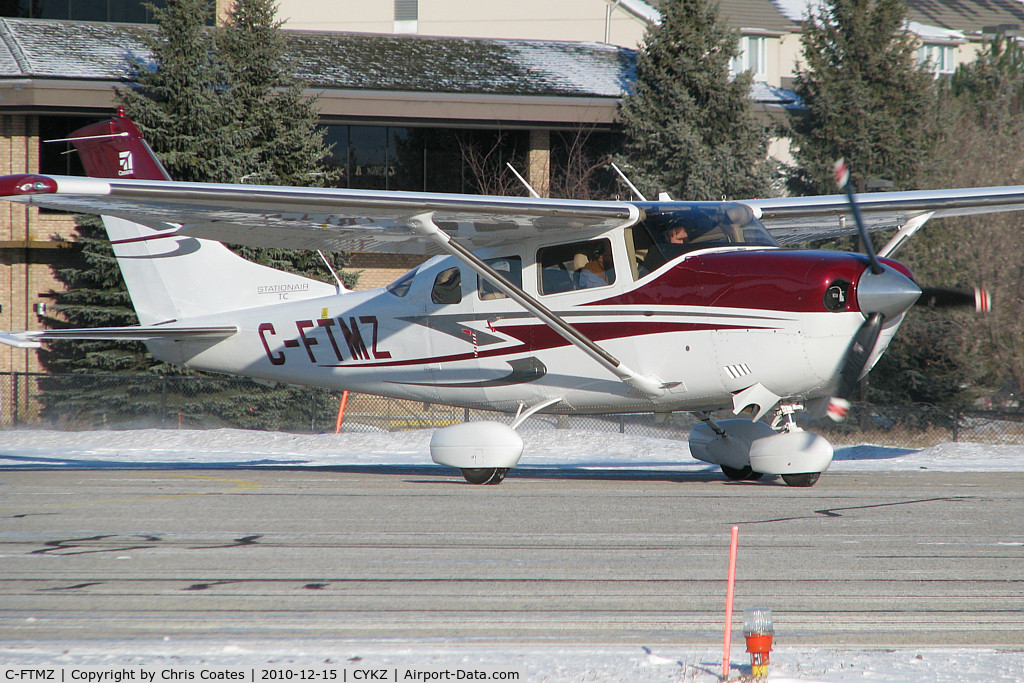 C-FTMZ, 2007 Cessna T206H Turbo Stationair C/N T20608734, This gorgeous Cessna Stationair was taxiing to position for takeoff on cold runway 33. Since this photo it has moved from Ontario out west to Alberta.