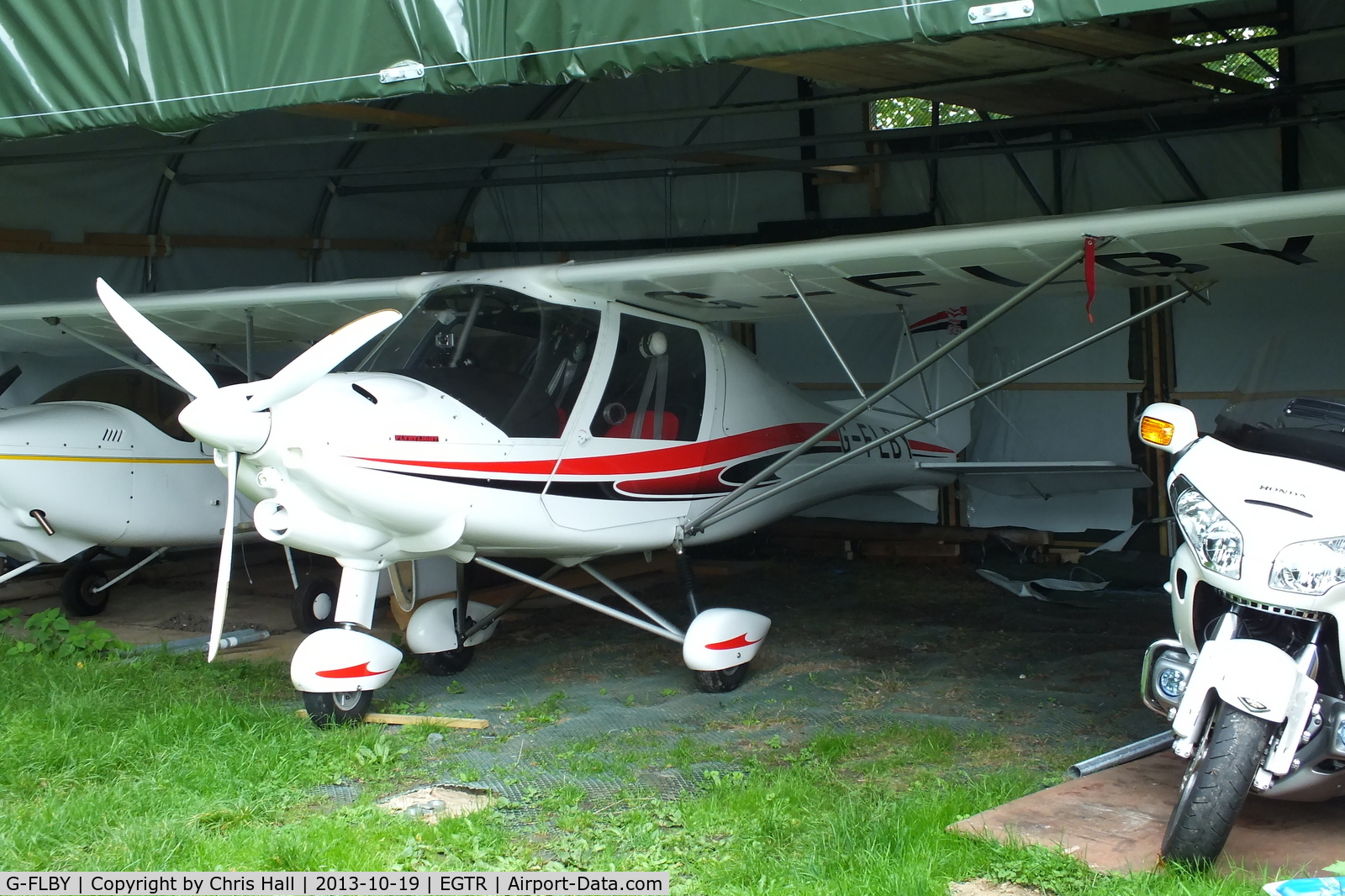 G-FLBY, 2013 Comco Ikarus C42 FB100 Bravo C/N 1302-7239, hangared at Elstree