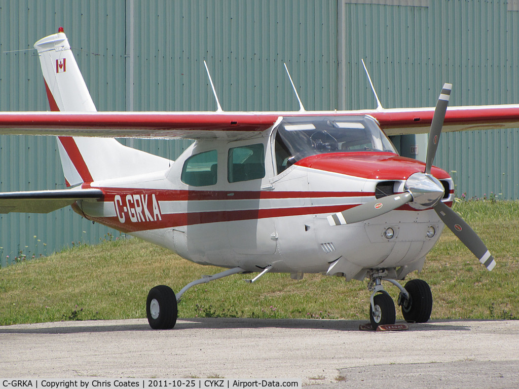 C-GRKA, 1975 Cessna 210L Centurion C/N 21060815, I'd love to go for a flight in a 210 Centurion like this some day. This one was resting between hangars at Buttonville this day.