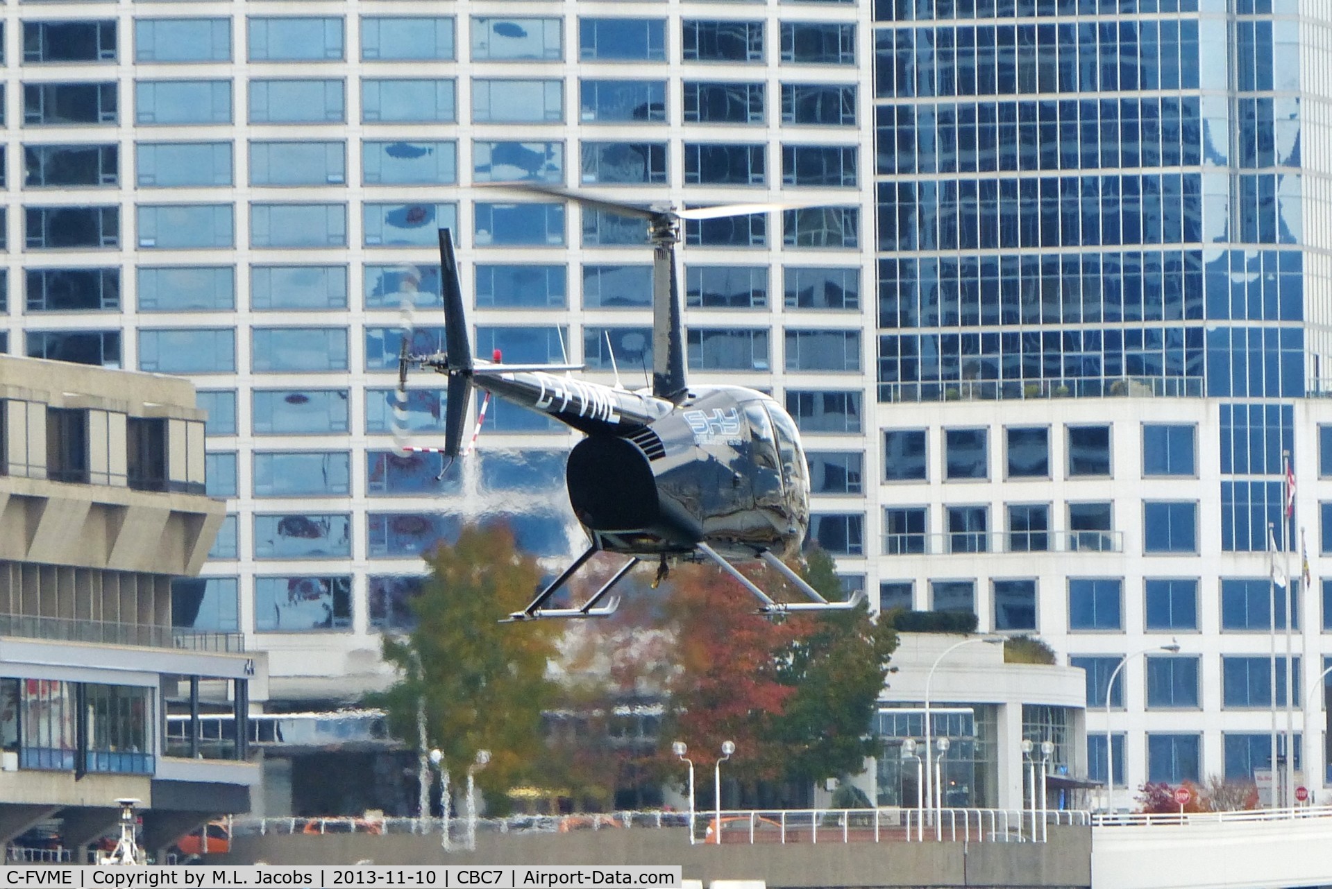 C-FVME, 2004 Robinson R44 II C/N 10562, Sky Helicopters landing at Vancouver Harbour Heliport.
