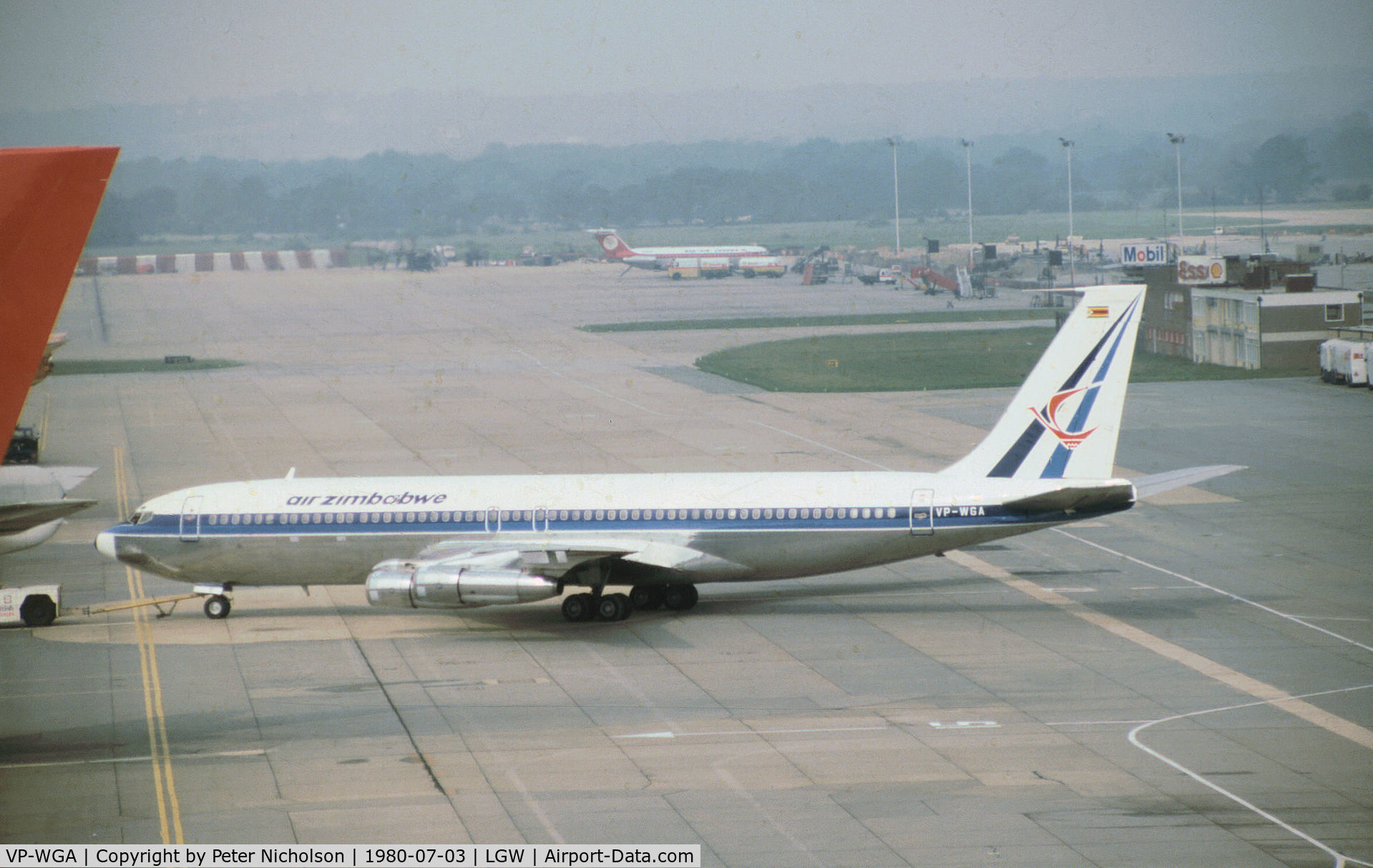 VP-WGA, 1969 Boeing 707-344C C/N 20110, Boeing 707-344C of Air Zimbabwe as seen at Gatwick in the Summer of 1980.