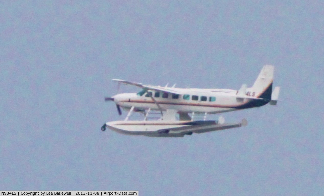N904LS, 2013 Cessna 208B Grand Caravan C/N 208B-5030, Flying downwind on Forest Lake #2 after having taken off.  Search N904LS on YouTube for video of same.