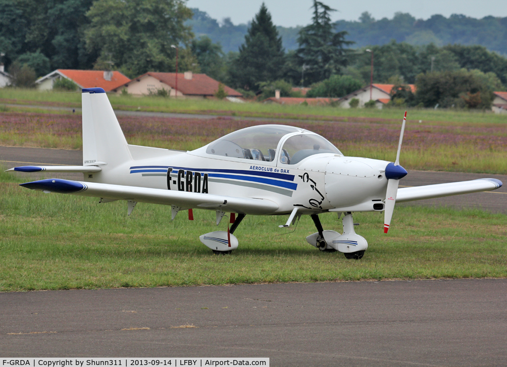 F-GRDA, 2006 Issoire APM 20 Lionceau C/N 18, Parked in the grass... Additional 'Aeroclub de Dax' titles now applied...