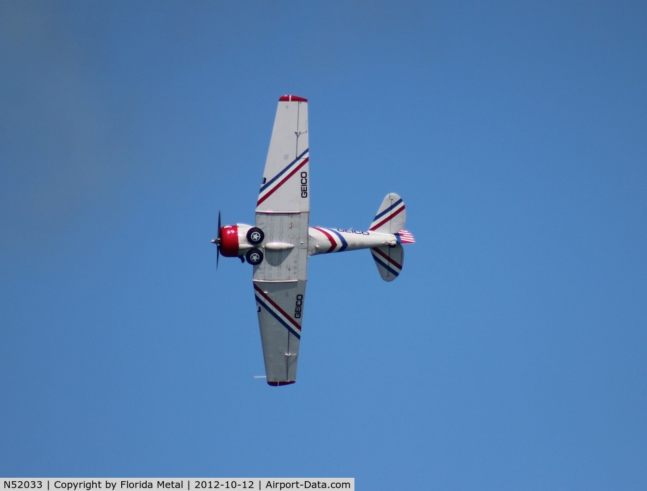 N52033, 1946 North American SNJ-2 Texan C/N 2040, Geico Skytypers SNJ-2 over Daytona Beach