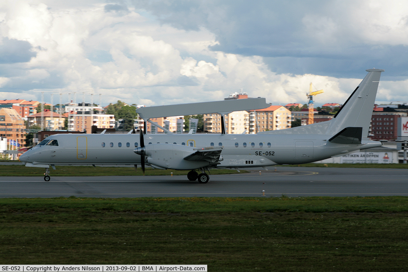 SE-052, 1997 Saab 2000 C/N 2000-052, Lining up runway 30.