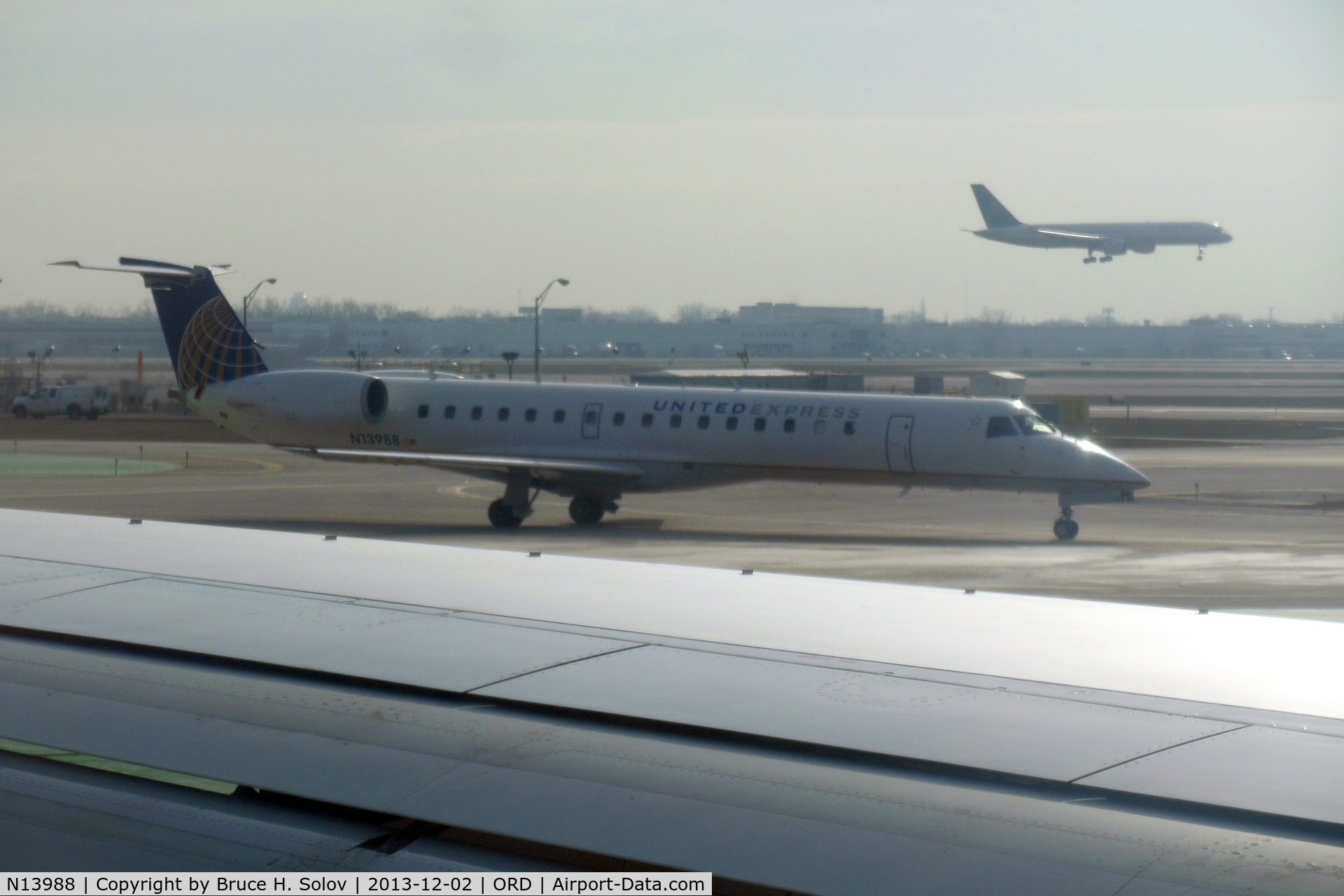 N13988, 2000 Embraer ERJ-145LR (EMB-145LR) C/N 145265, seen from the window of my plane at ORD