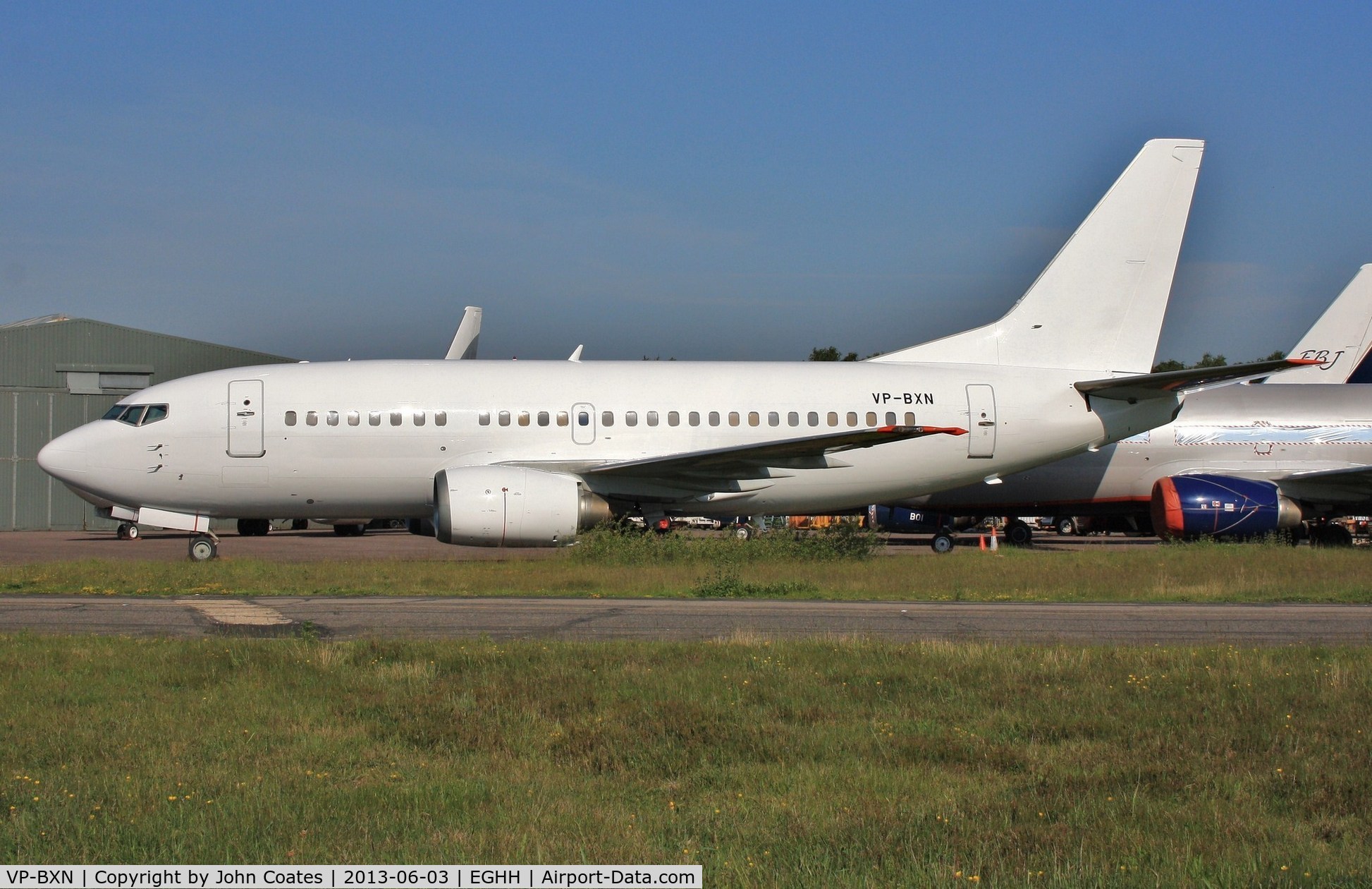 VP-BXN, 1990 Boeing 737-53A C/N 24754, Now all white.