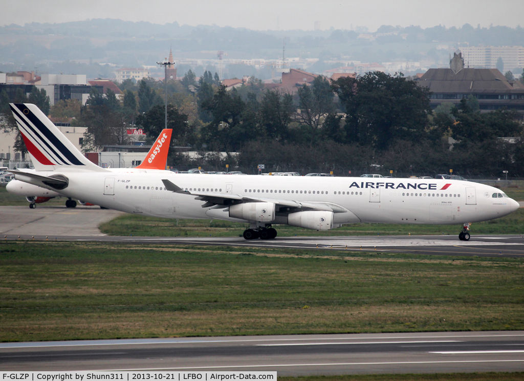 F-GLZP, 1999 Airbus A340-313X C/N 260, Lining up rwy 14L for departure... new c/s
